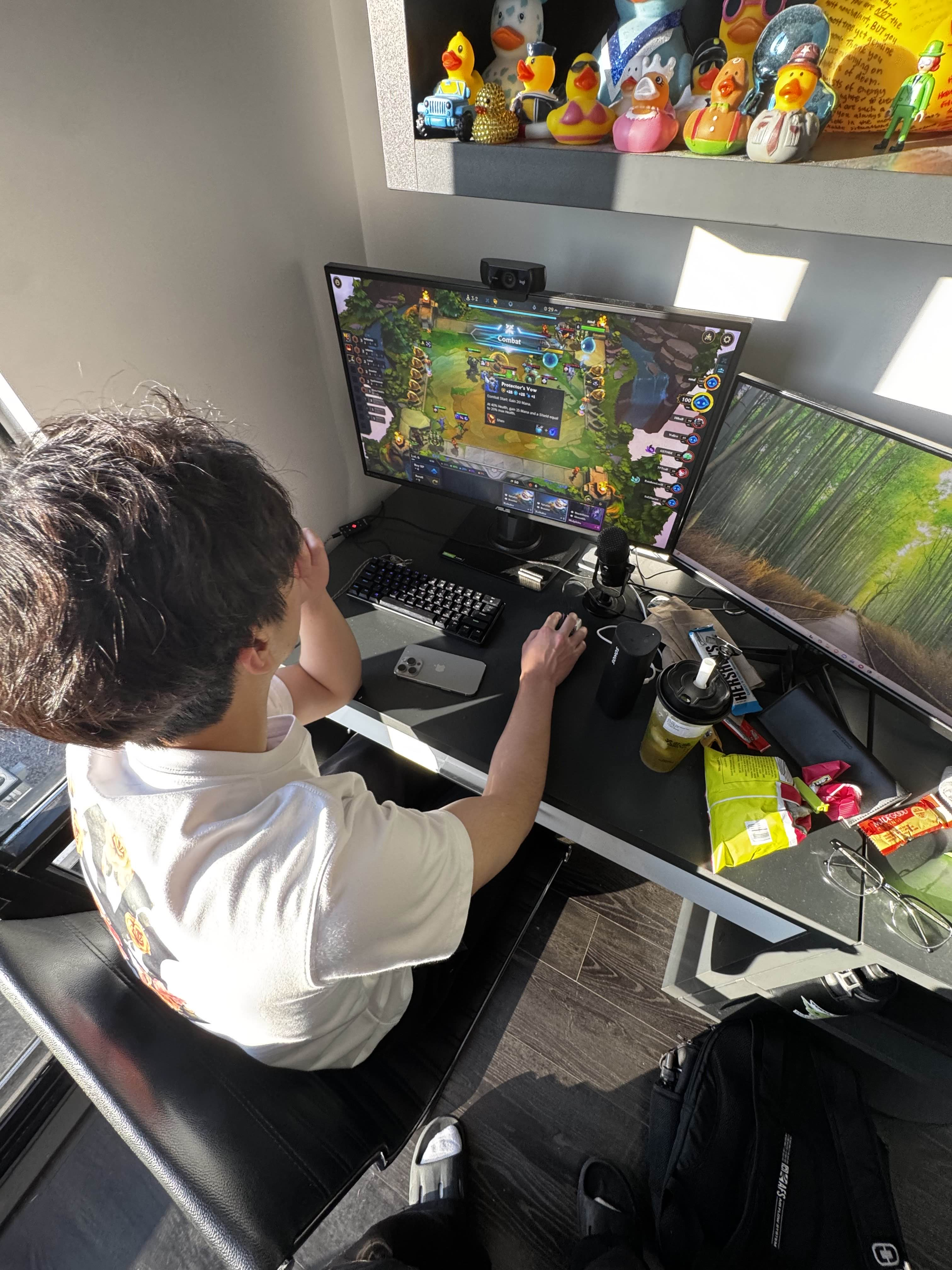 Playing Teamfight Tactics at a desk